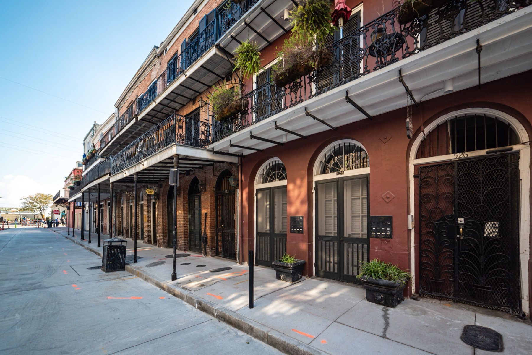Iron-gallery townhouses on a French Quarter street, New Orleans